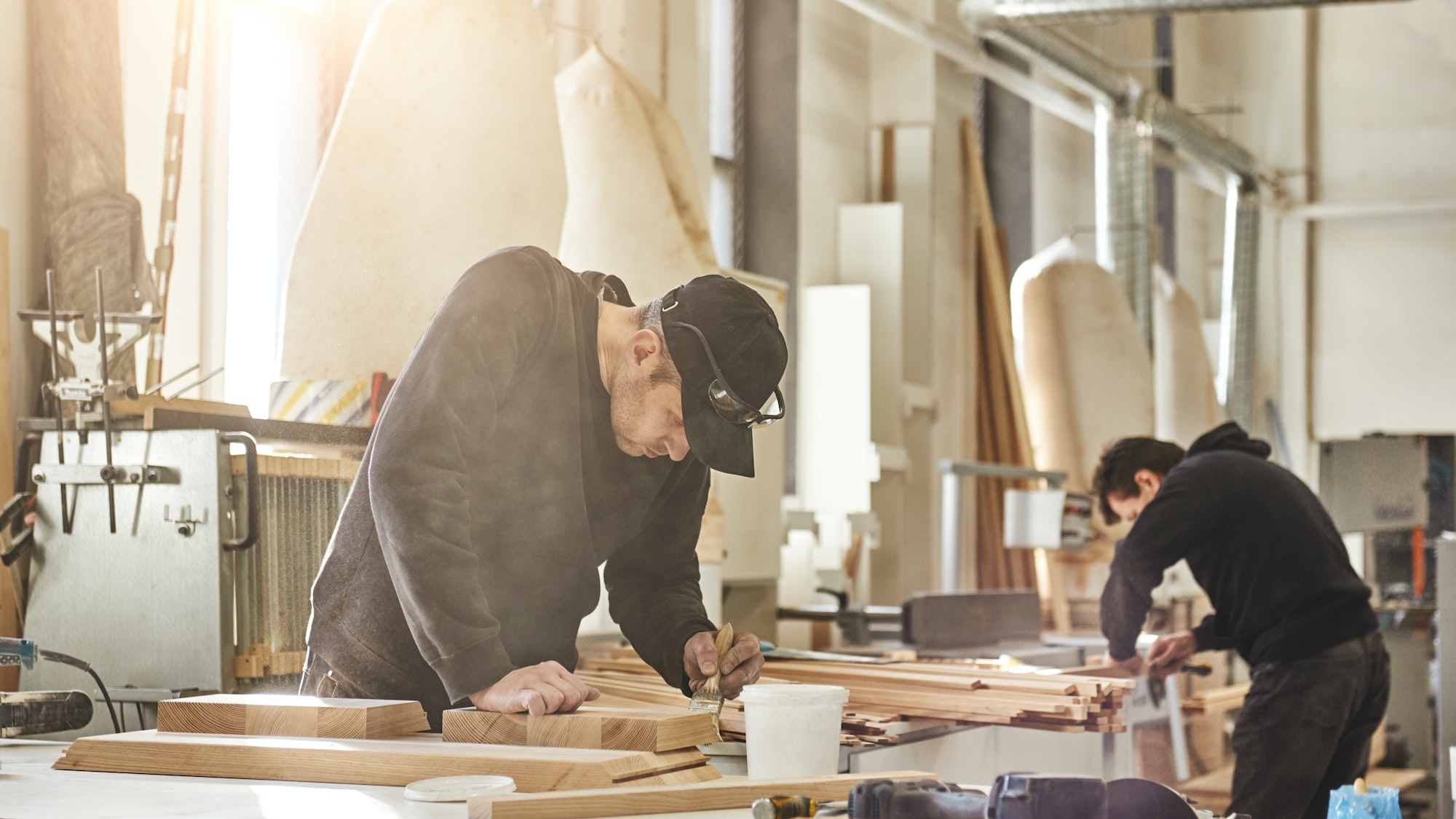 Custom projects with artistic, design oriented value. Portrait of caucasian worker holding a brush