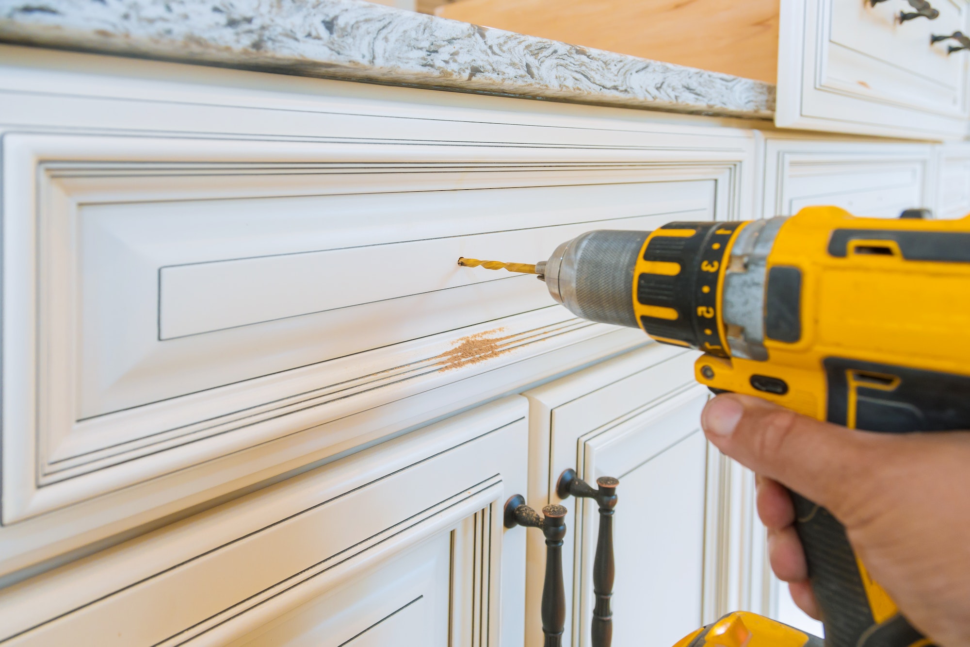 Handle installation drawers in custom kitchen cabinets