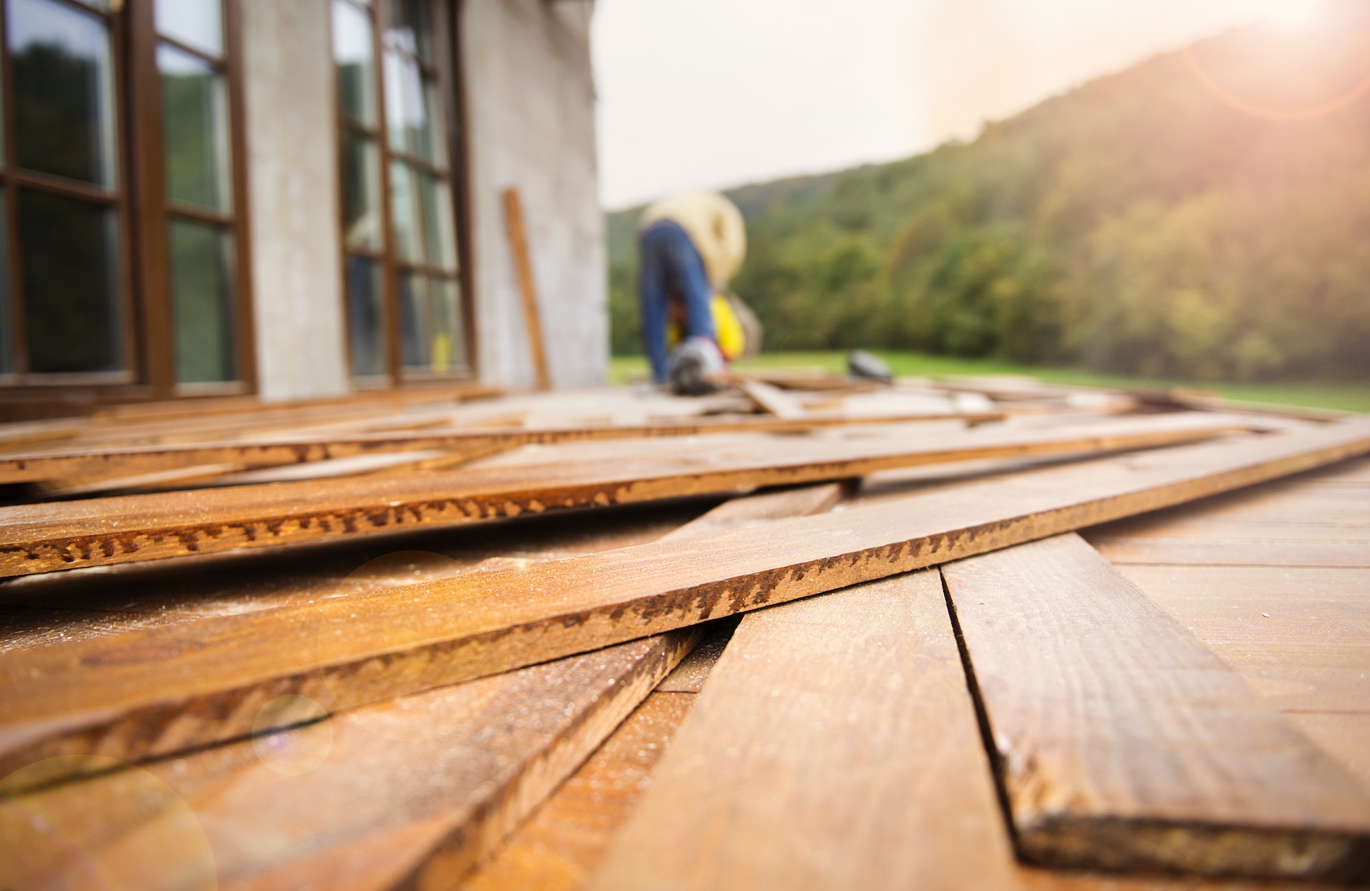 Unfinished wooden flooring in patio